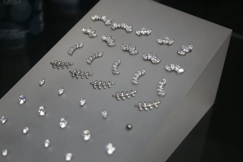 Silver and crystal piercing jewellery on the tray