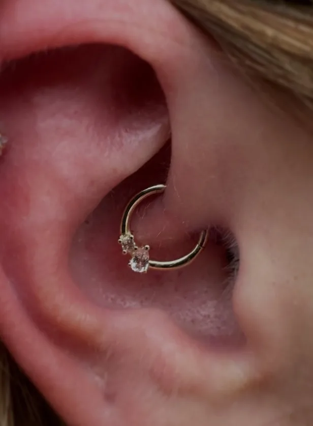 A fresh piercing with a small stud